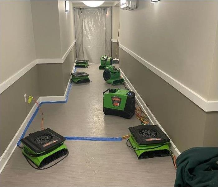 A hotel hallway that suffered from water damage with our SERVPRO drying equipment.