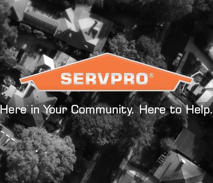 A SERVPRO graphic with our logo and the message "Here in your community. Here to help."